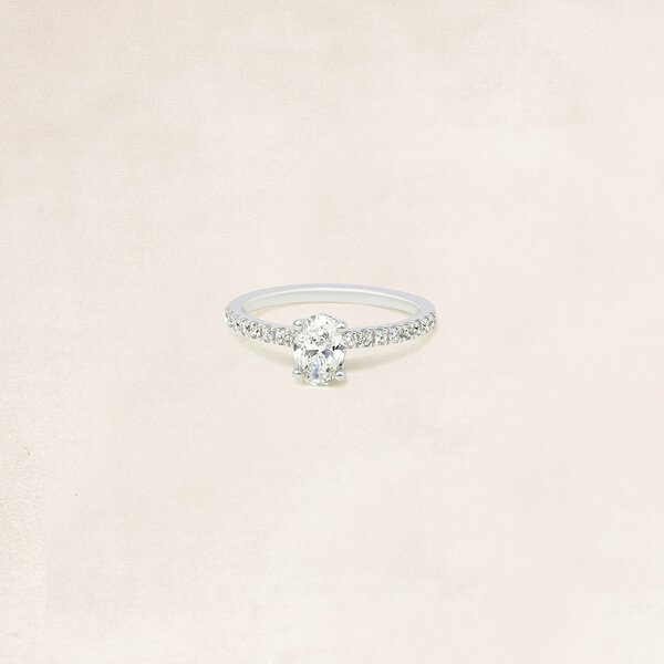 Oval cut solitaire ring with side diamonds - OR5108
