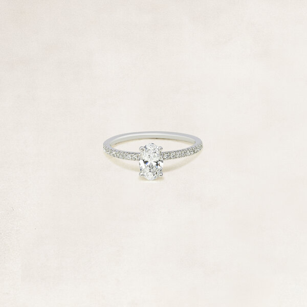 Oval cut solitaire ring with side diamonds - OR5075
