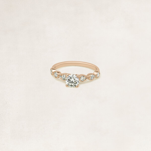 Brilliant cut solitaire ring with side diamonds - OR5031