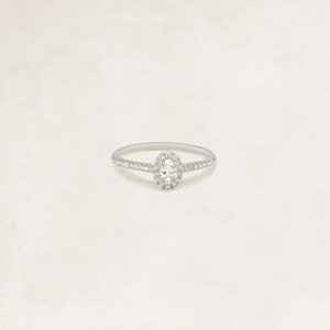 Oval cut halo ring with side diamonds - OR61820